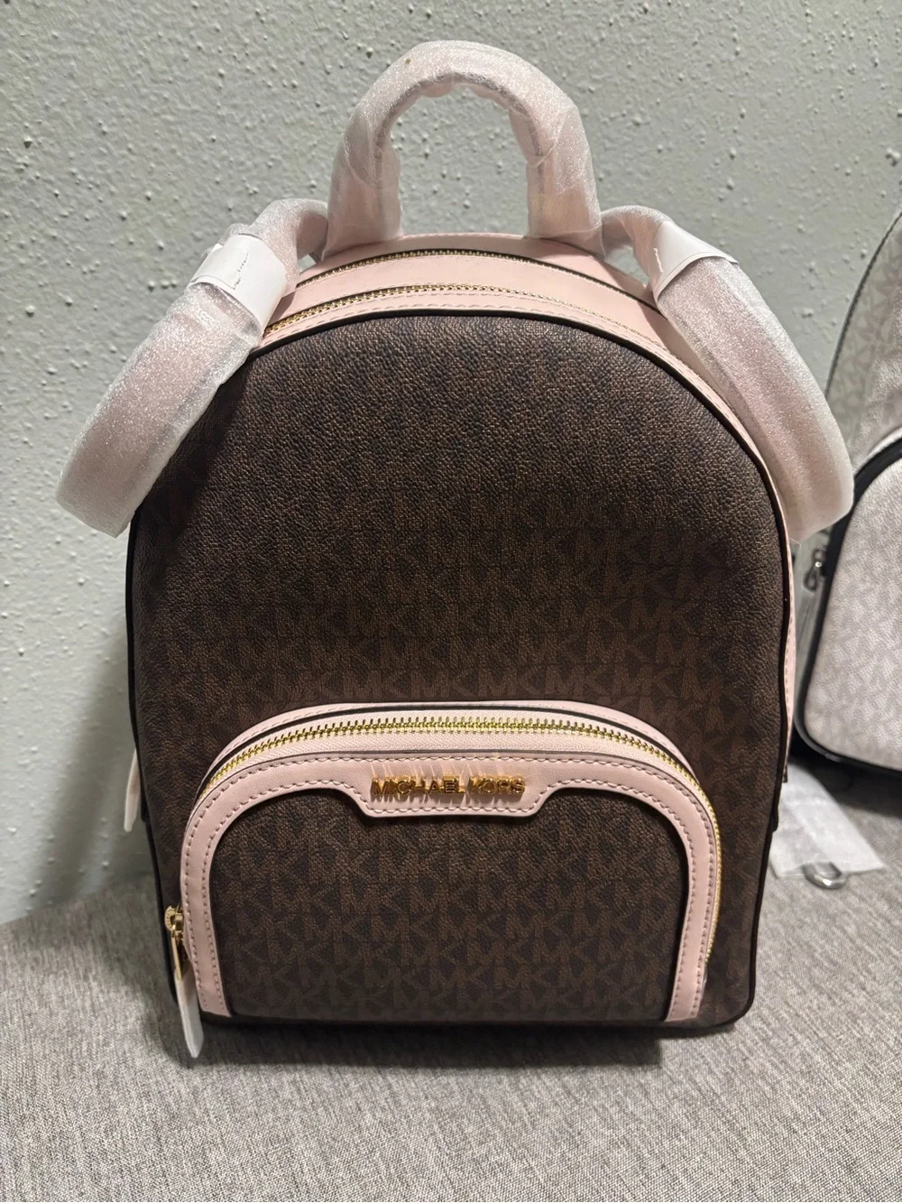 MK bags white and black , pink and brown